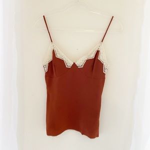 Dolce & Gabbana cami XS authentic with minor damage to lace